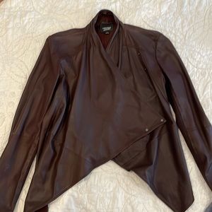 Light leather jacket, brown.  Cape like look.